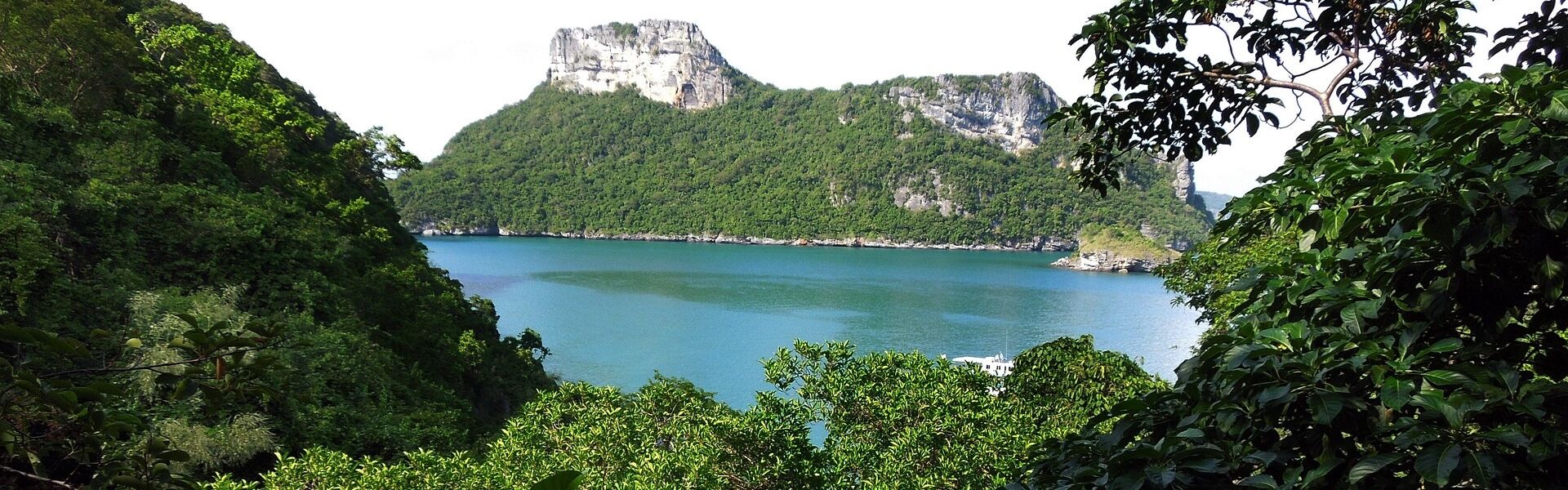 Iconic Ang Thong archipelago in Thailand on a vibrant Ang Thong Travel guide banner by Legend Travel Group.